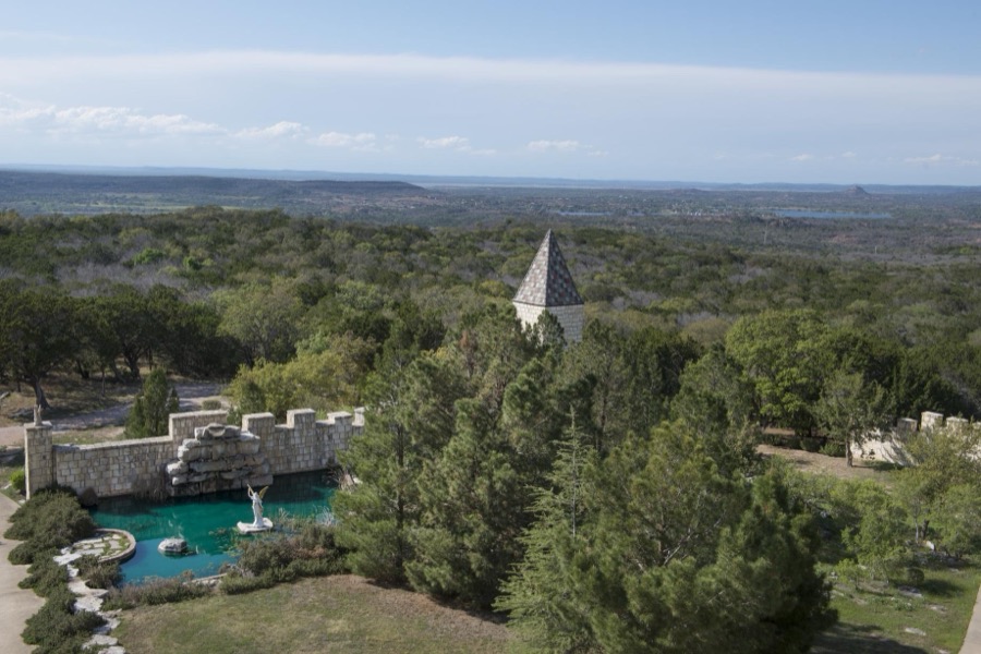 A portion of the garden and decorative pool at Falkenstein Castle, built from scratch as a residence by Kim and Terry Young in the hills below Burnet in the Texas Hill Country