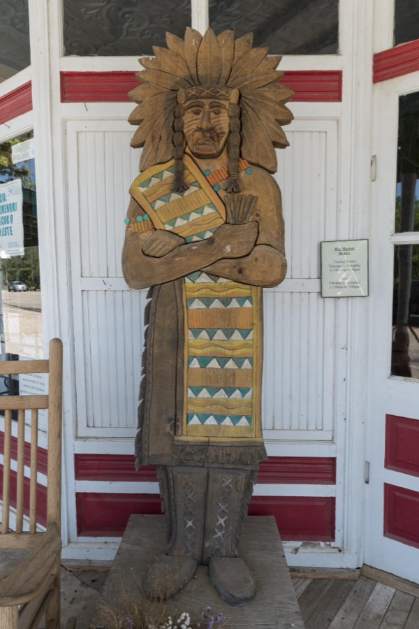 "Wooden Indian" at the old "Hye" store and post office in Blanco County, west of Johnson City, Texas