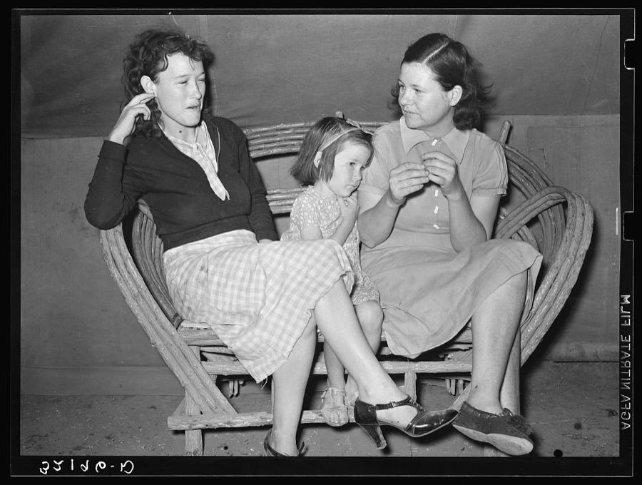Migrant workers talking near Harlingen, Texas