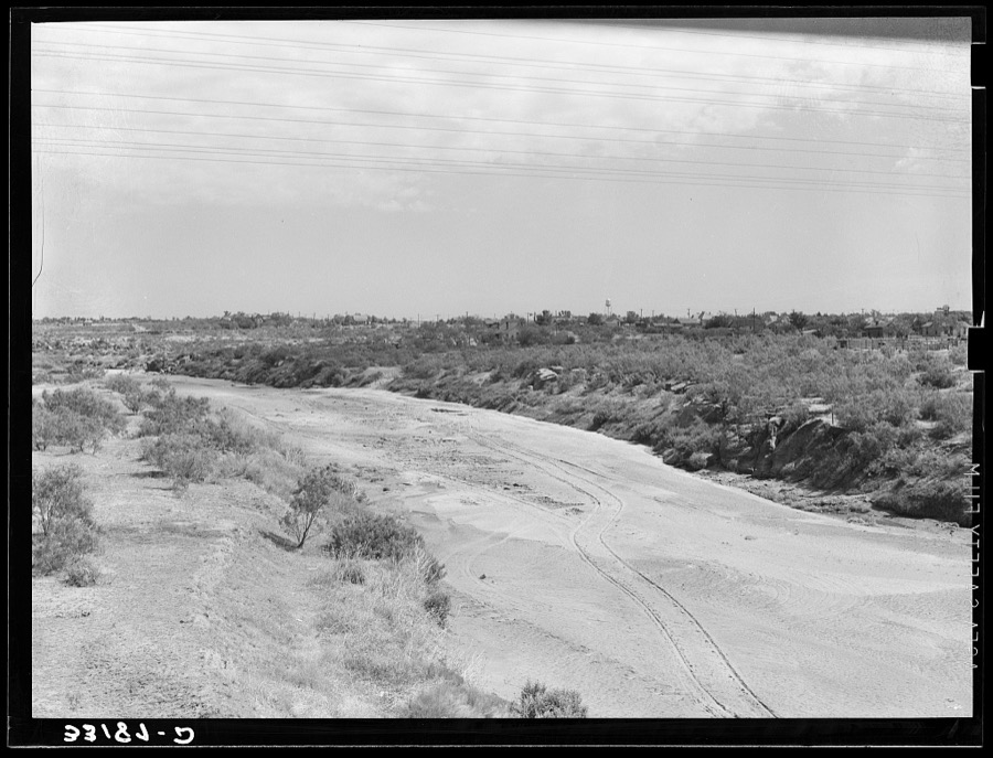 Wagon tracks down the dry bed of the Colorado River at Colorado, Texas. Rivers and streams of the Southwest are often dry during periods of drought