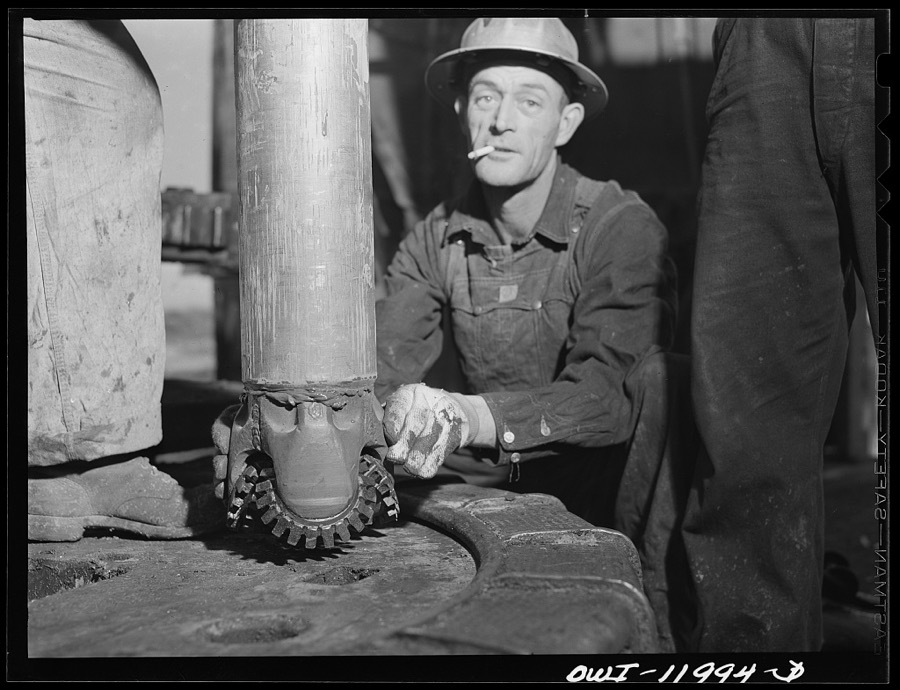 Andrews County, Texas. Attaching new bit to the drill pipe
