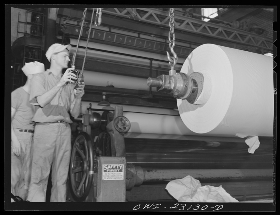 Lufkin, Texas. Southland paper mill. Newsprint rolling out at the end of a paper machine