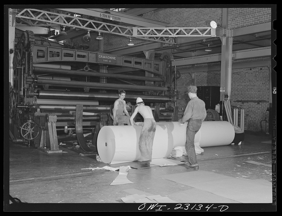 Lufkin, Texas. Southland paper mill. Newsprint rolling out at the end of a paper machine
