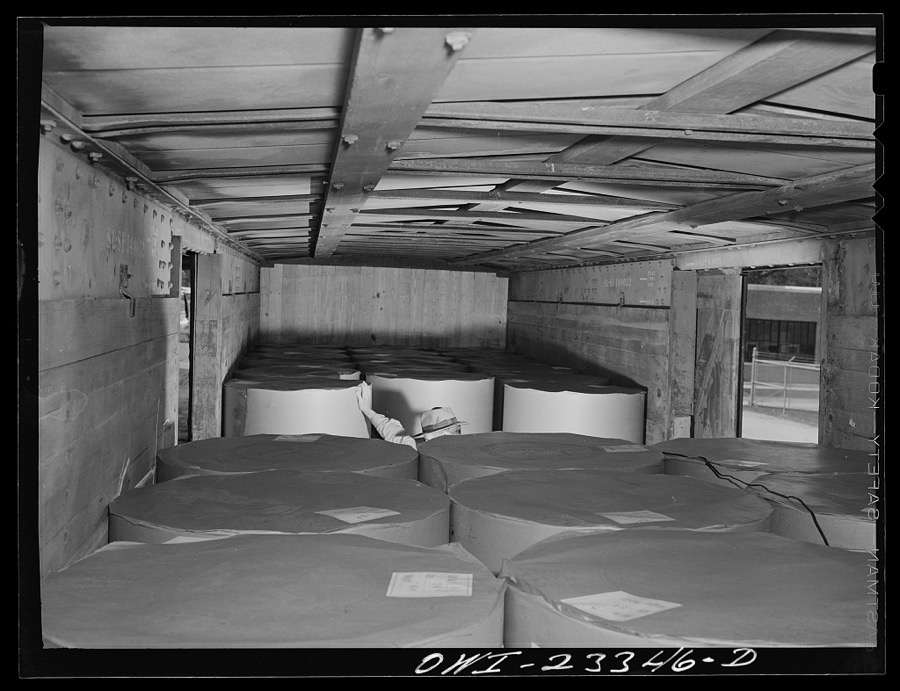 Lufkin, Texas. Southland paper mill. Freight car loaded with rolls of newsprint