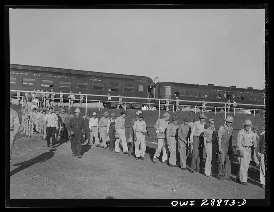 Freeport Sulphur Company, Hoskins Mound, Texas. Sulphur workers arriving at the plant