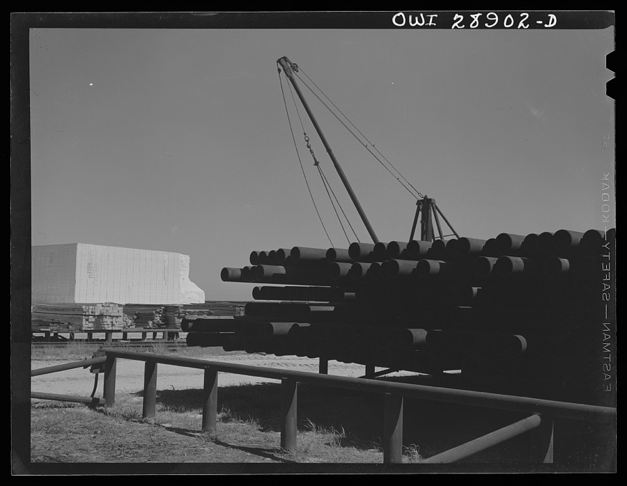 Freeport Sulphur Company. Hoskins Mound, Texas. Pipe storage. Pipelines are laid for carrying superheated water to the wells and for carrying melted sulphur to relay stations and to the vats