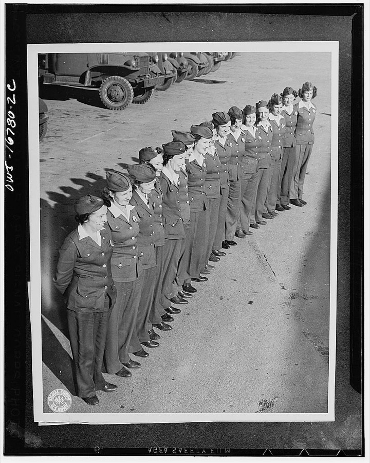 San Antonio, Texas. The gags about women drivers fall flat at the United States Army quartermaster depot, where 35 young ladies are replacing men drivers and have rolled up an enviable service and safety record. They handle all types of equipment. They are lined up in their regulation uniforms consisting of blue slacks, coat, and overseas cap, white shirt, dark brown or blue socks, and brown oxfords