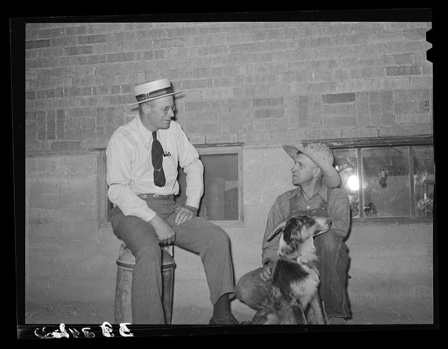 Mr. Thayne, FSA (Farm Security Administration) cooperative specialist, talking to one of the Ericson brothers about forming a cooperative tractor society. Box Elder County, Utah