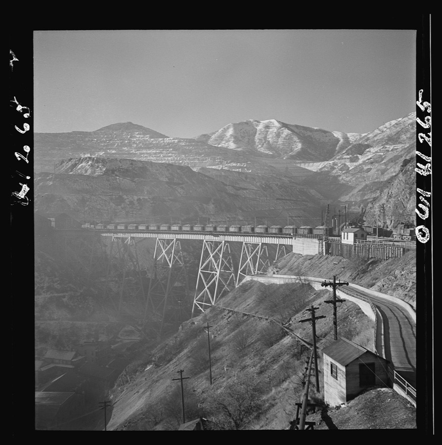 Bingham Canyon, Utah. Open-pit workings of the Utah Copper Company, showing loaded ore trains in the foreground