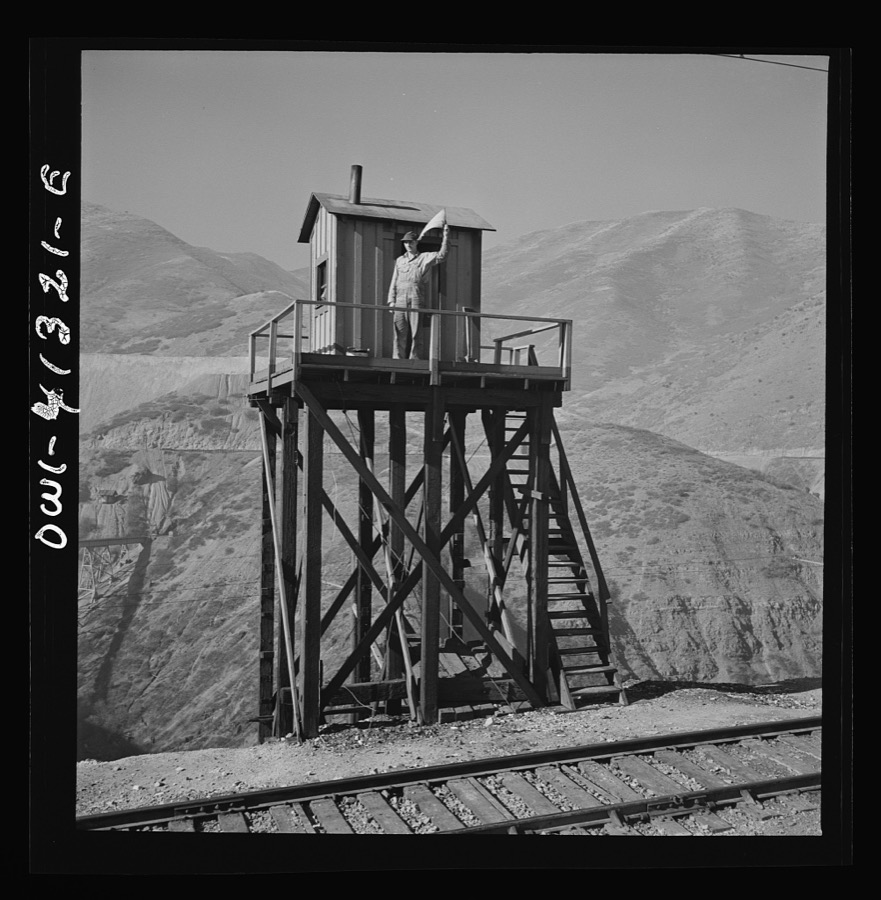 Bingham Canyon, Utah. Signalman of the Utah Copper Company at its open-pit mine workings