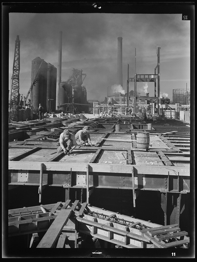 Columbia Steel Company at Geneva, Utah. Steel and concrete go into place rapidly as a new steel mill takes form. The new plant will make important additions to the vast amount of steel needed for the war effort
