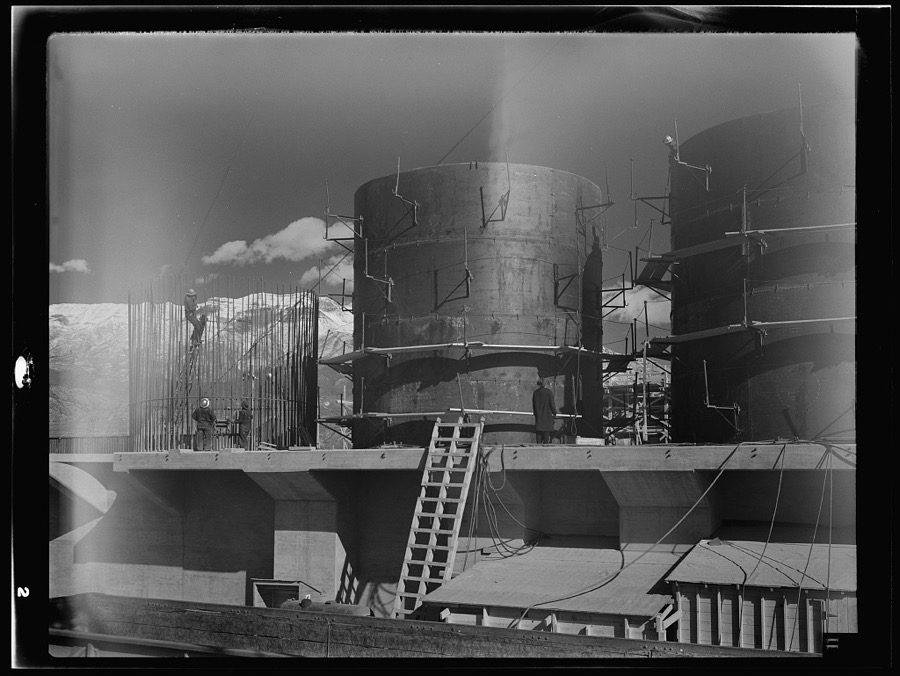 Columbia Steel Company at Geneva, Utah. The erecting crane is kept busy as blast furnaces take form in a new steel mill under construction which will make important additions to the vast amount of steel needed for the war effort