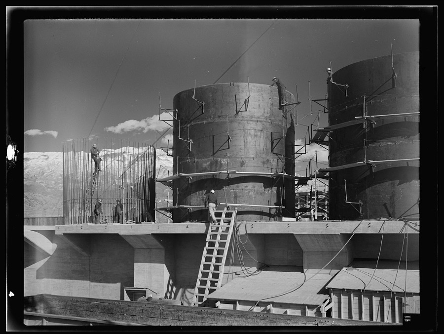 Columbia Steel Company at Geneva, Utah. The erecting crane is kept busy as blast furnaces take form in a new steel mill under construction which will make important additions to the vast amount of steel needed for the war effort