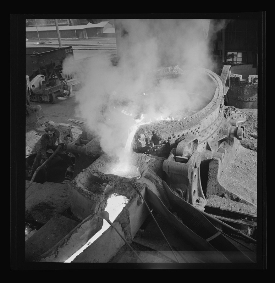 Columbia Steel Company at Ironton, Utah. Pouring a heat of iron