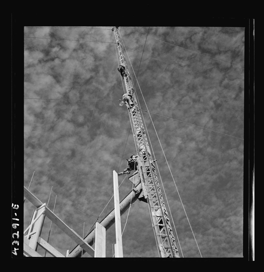 Columbia Steel Company at Geneva, Utah. Surveyor running lines for a water intake tunnel to serve a new steel mill under construction which will make important additions to the vast amount of steel needed for the war effort