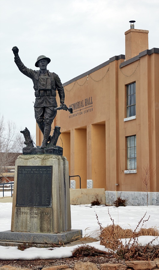 A "doughboy" statue honoring fallen Americans in World War I, erected in 1926 outside Memorial Hall and Recreation Center in the small central-Utah city (population c. 3,500) of Mt. Pleasant