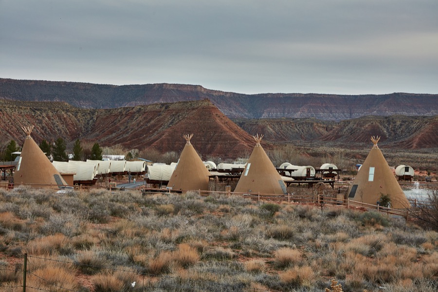 A modern campground that evokes Old West imagery, including Conestoga wagons and likenesses of Indian tipis, in the town of Virgin in southwest Utah