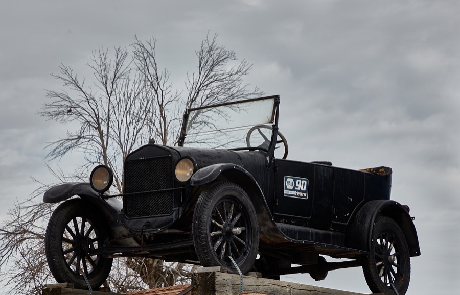 A vintage automobile displayed above a downtown building (also vintage) in the city of Ephraim (pronounced "EEF-rum) in Utah's Sanpete Valley, sometimes called "Little Denmark" after the large number of Scandinavian (especially Danish) newcomers who settled there