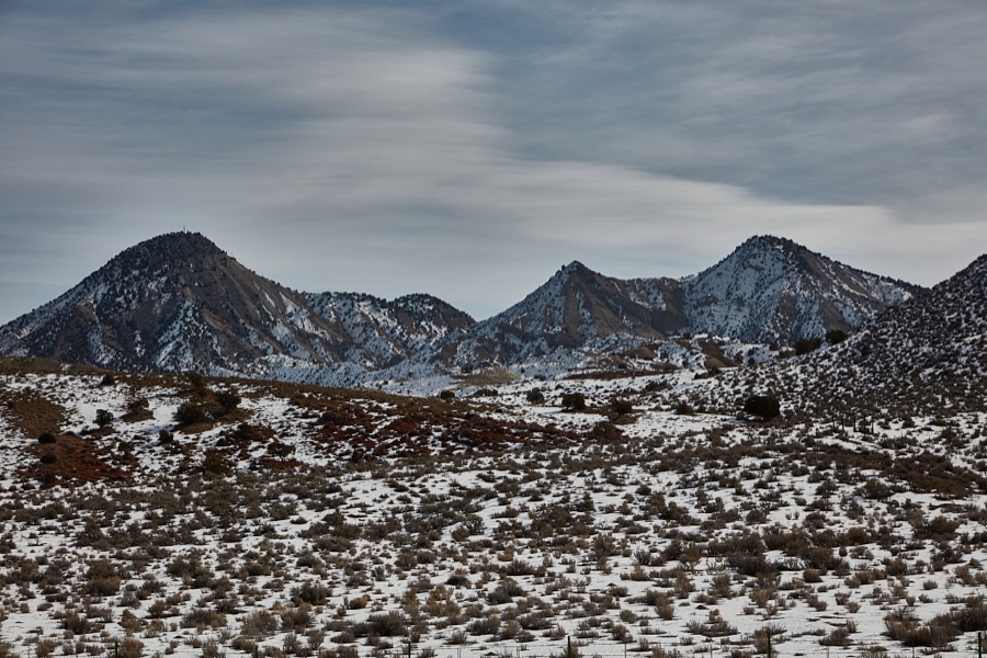 A recent snowfall gives the low mountains outside the city of Richfield a powdered-sugar look in the western U.S. state of Utah
