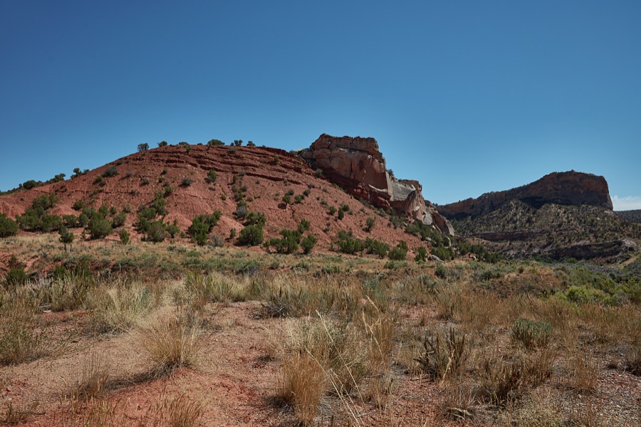 Red rocks dominate in the rugged Uinta Mountains of Uintah County near the Colorado border in northeast Utah, but the coloration will turn to caramel a few miles ahead