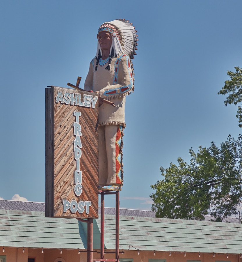An American Indian figure in full headdress calls attention to the Ashley Trading Post gift shop in the small city of Vernal in eastern Utah's Uintah County