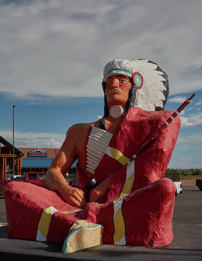 This colorful and gigantic figure of a seated American Indian in full headdress can't be missed outside the Ute Crossing Trading Post in the town of Fort Duschene in northeastern Utah