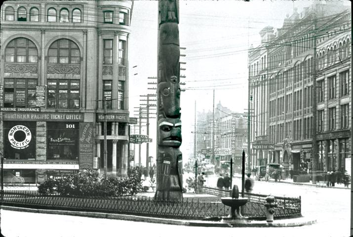 Photograph of Pioneer Building, Pergola, and Totem Pole