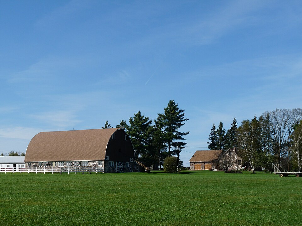 Photograph of Harold J. and Agnes McFarlane Stone House and Barn
